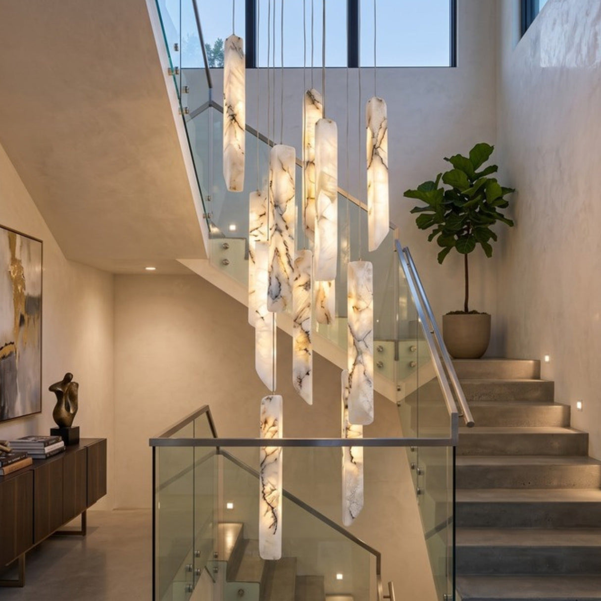Grenoble LED 13 Light Blade Alabaster Chandelier in brass, flat alabaster blades cascading at staggered heights above a stairwell landing.
