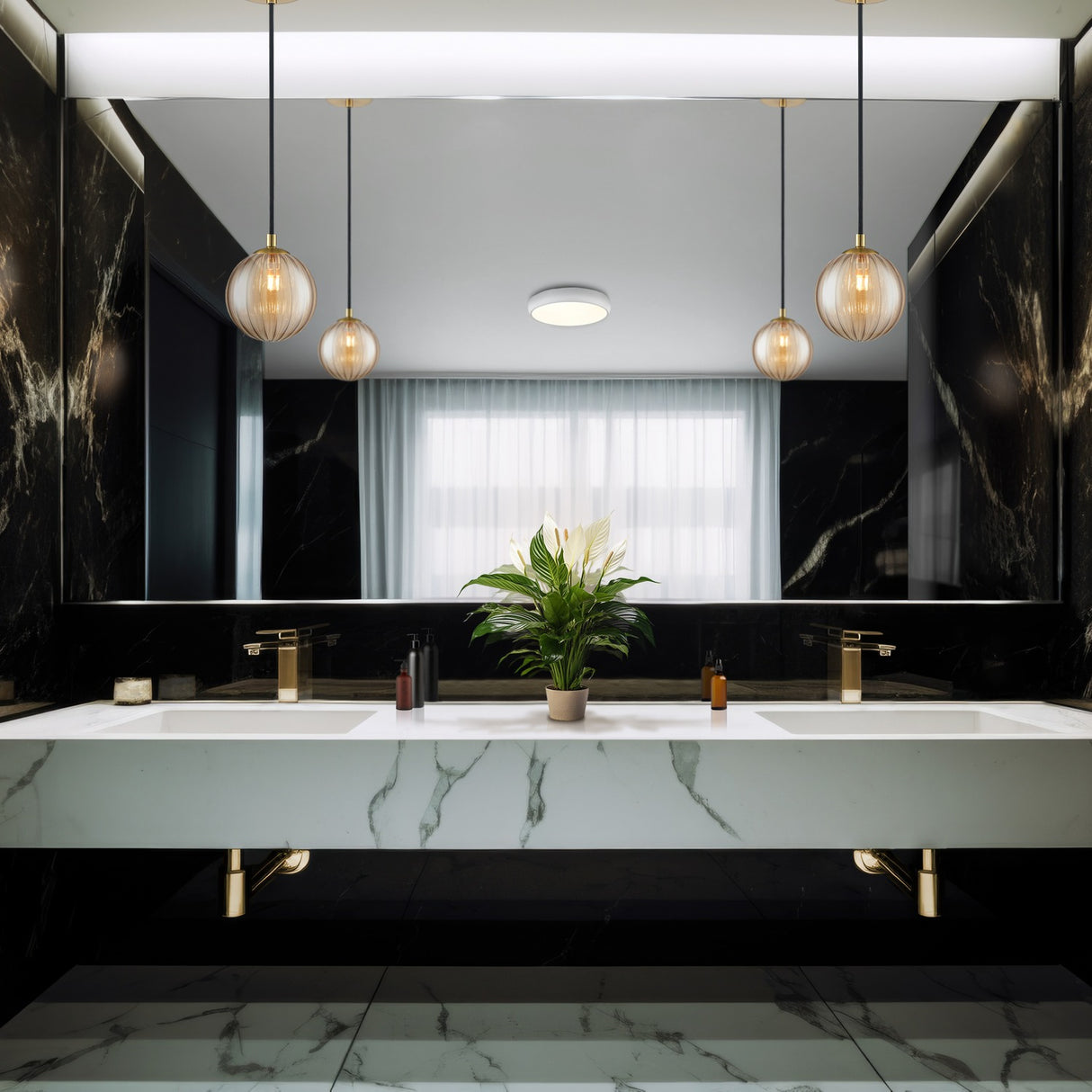 Globe pendant light in brass finish, shown in a room setting