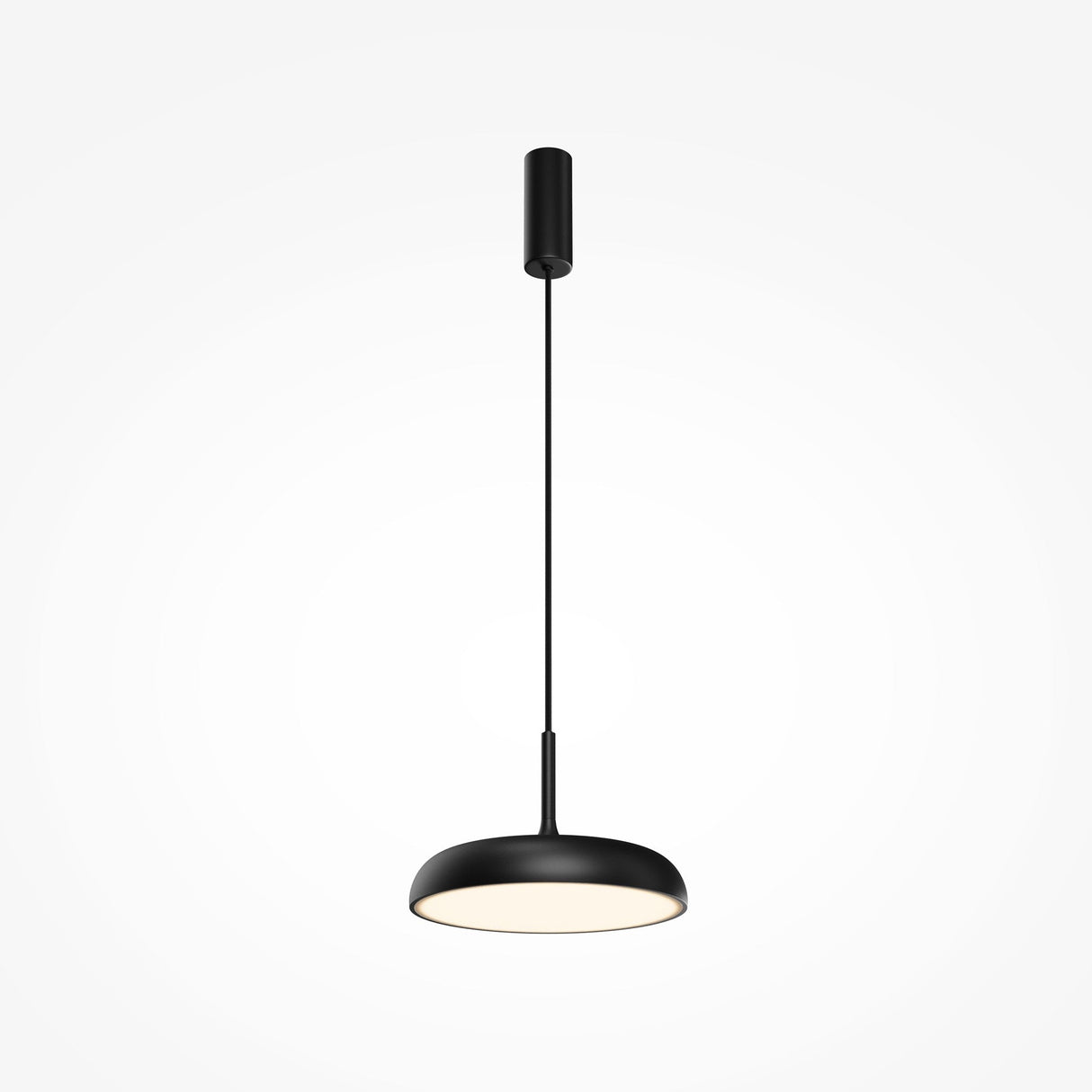 The Gerhard LED Dome Pendant Light 30cm - Black offers a contemporary black pendant with a flat, circular shade. Hung by a thin cable from a cylinder mount, it emits energy-efficient light that softly glows downward against the light gray backdrop.