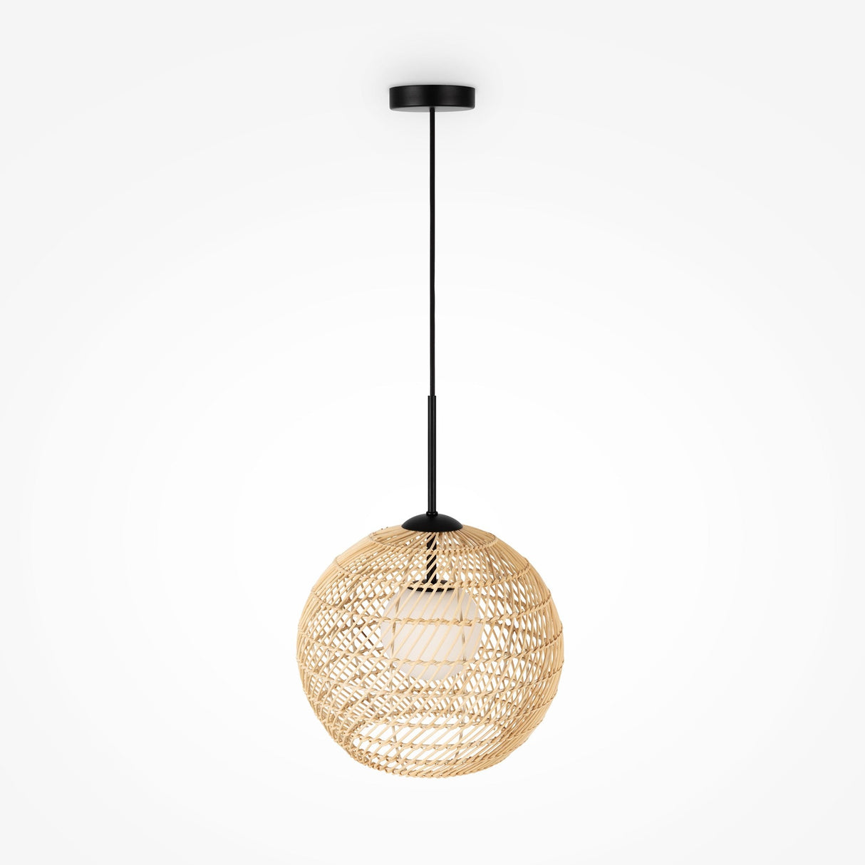 A Cane Pendant Light 30cm in black and beige wicker with a white glass diffuser hangs from an adjustable wire against a white background, radiating a warm glow through the woven shade.
