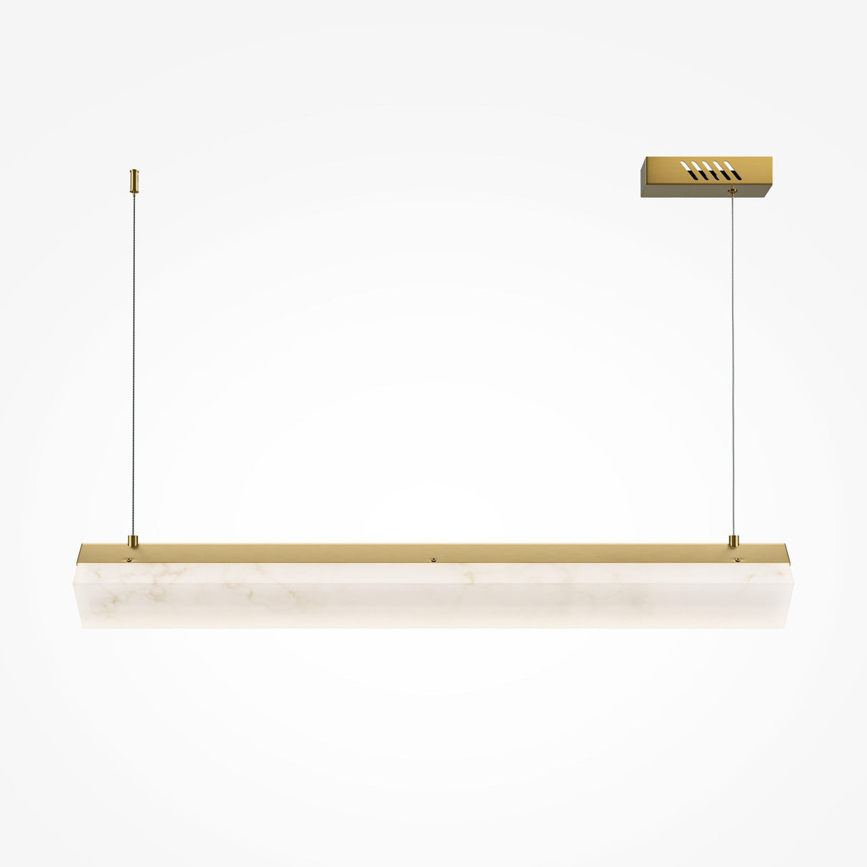 The Petra LED Linear Suspension Light, a rectangular fixture with a brass finish and translucent white shade, hangs from the ceiling by two cables. Made from natural stone, its design complements contemporary interiors and stands out against a white backdrop.