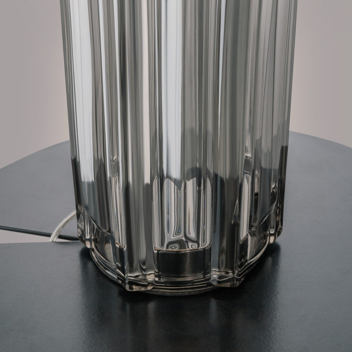 Mounting components for Muse Table Lamp in grey with white shade, showing the lamp’s adaptability for various decor styles