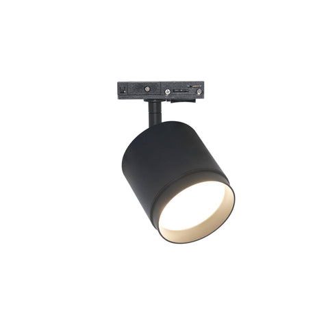 The Polar LED Single Phase Unity Track Spotlight in black features a minimalist cylindrical design with a white interior, mounted on a rail to cast downward accent lighting, illuminating a circular area and enhancing any space with its simple yet modern appeal.