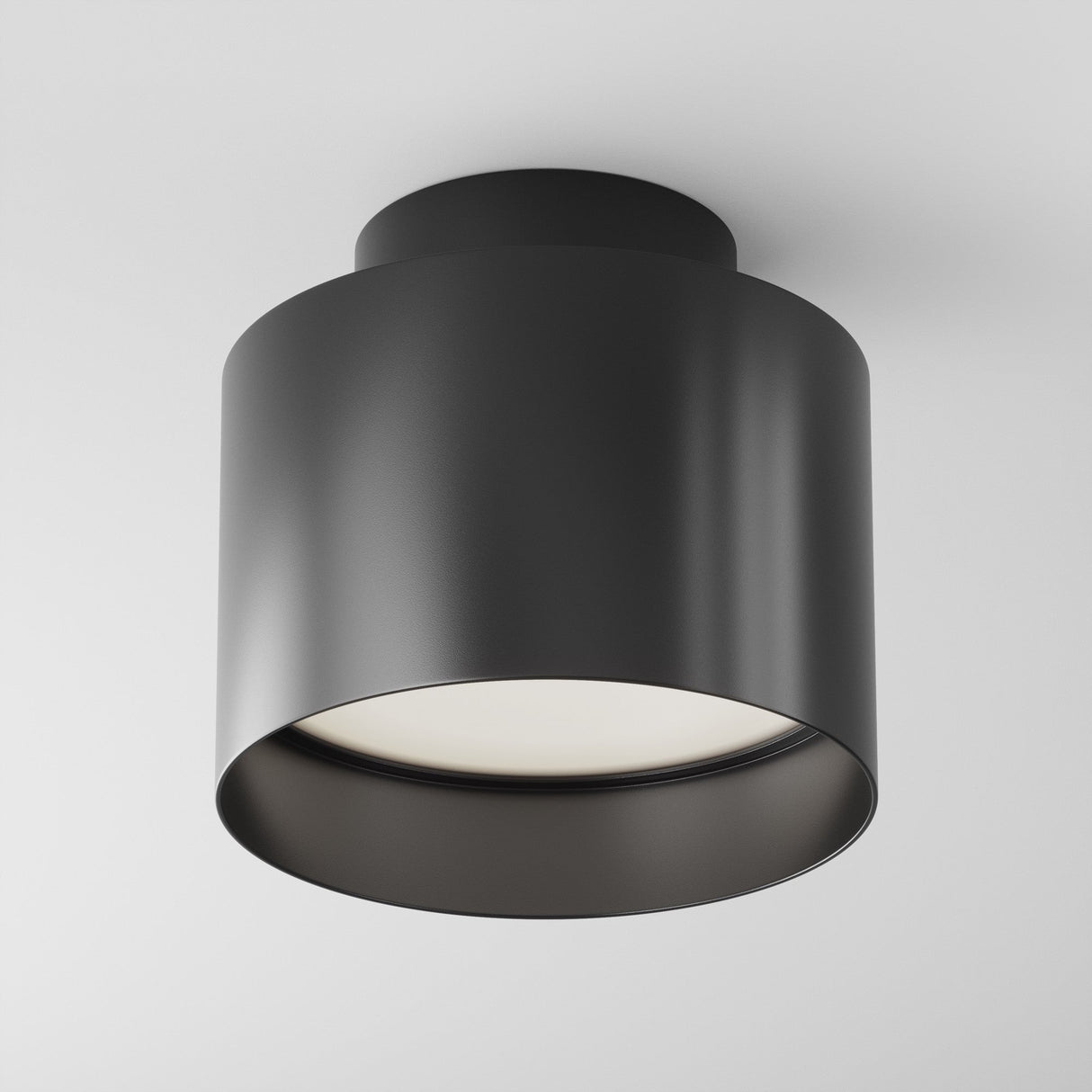 Additional perspective of Planet LED Small Round Surface Downlight in Black, highlighting its round shape and stylish appearance.