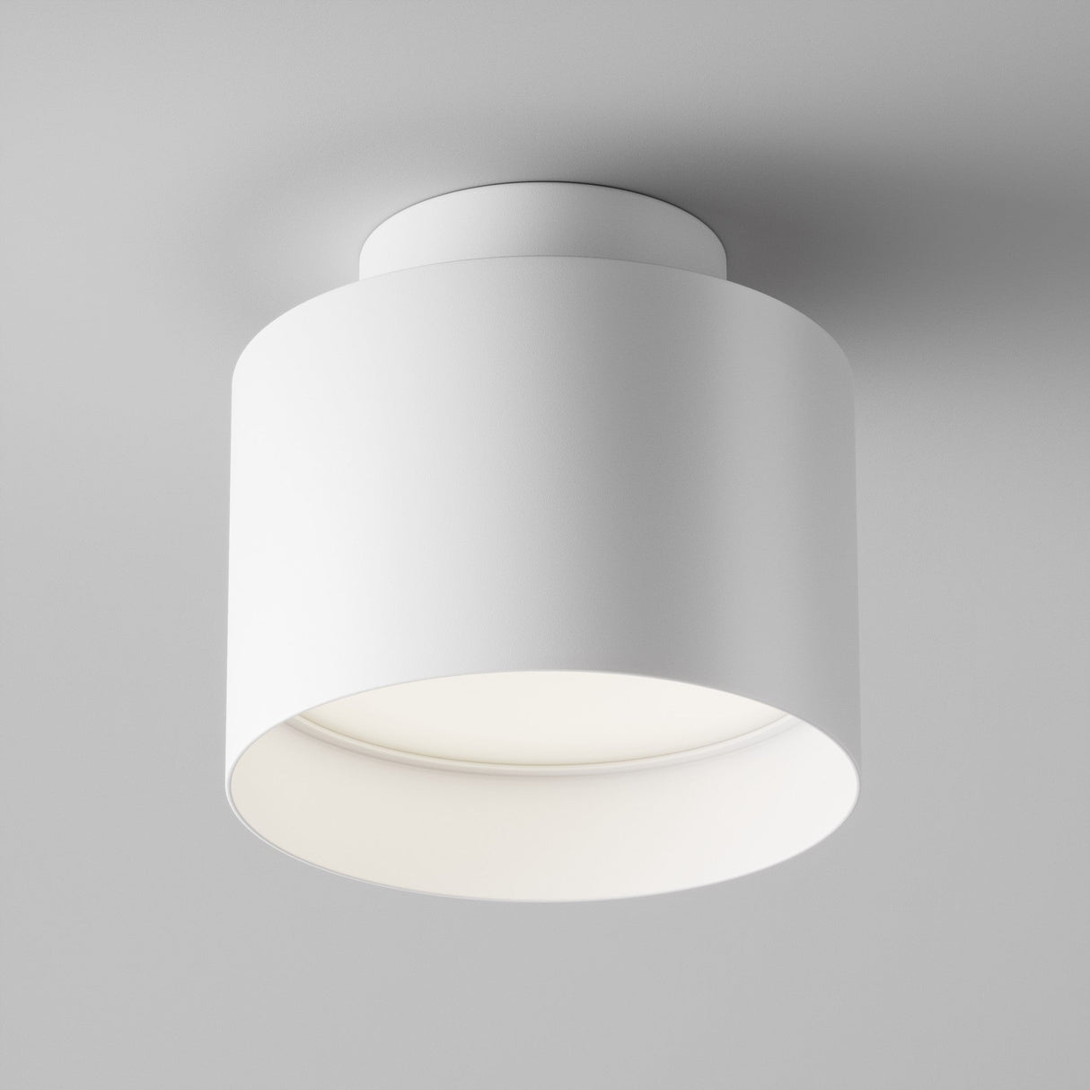 Additional perspective of Planet LED Small Round Surface Downlight in White, featuring its rounded form for ambient illumination.