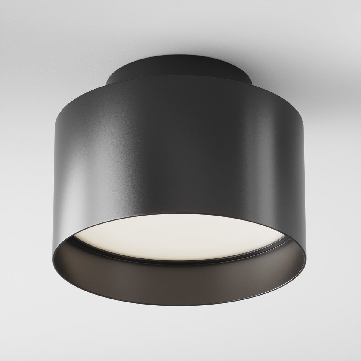 Additional perspective of Planet LED Medium Round Surface Downlight in Black, emphasizing its round shape and contemporary look.