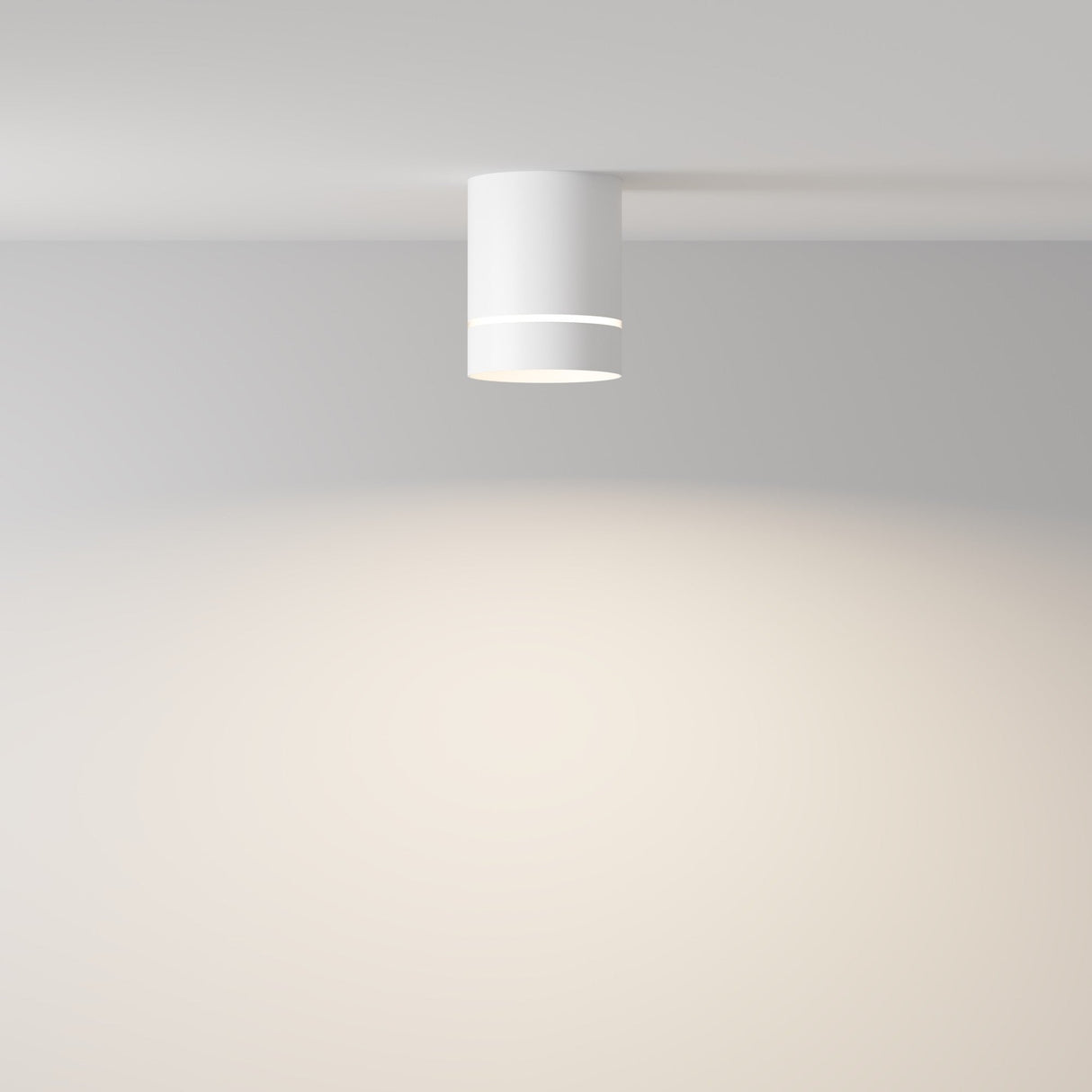 Additional perspective of Orlo LED Round Surface Downlight in White, showcasing its smooth and functional structure.