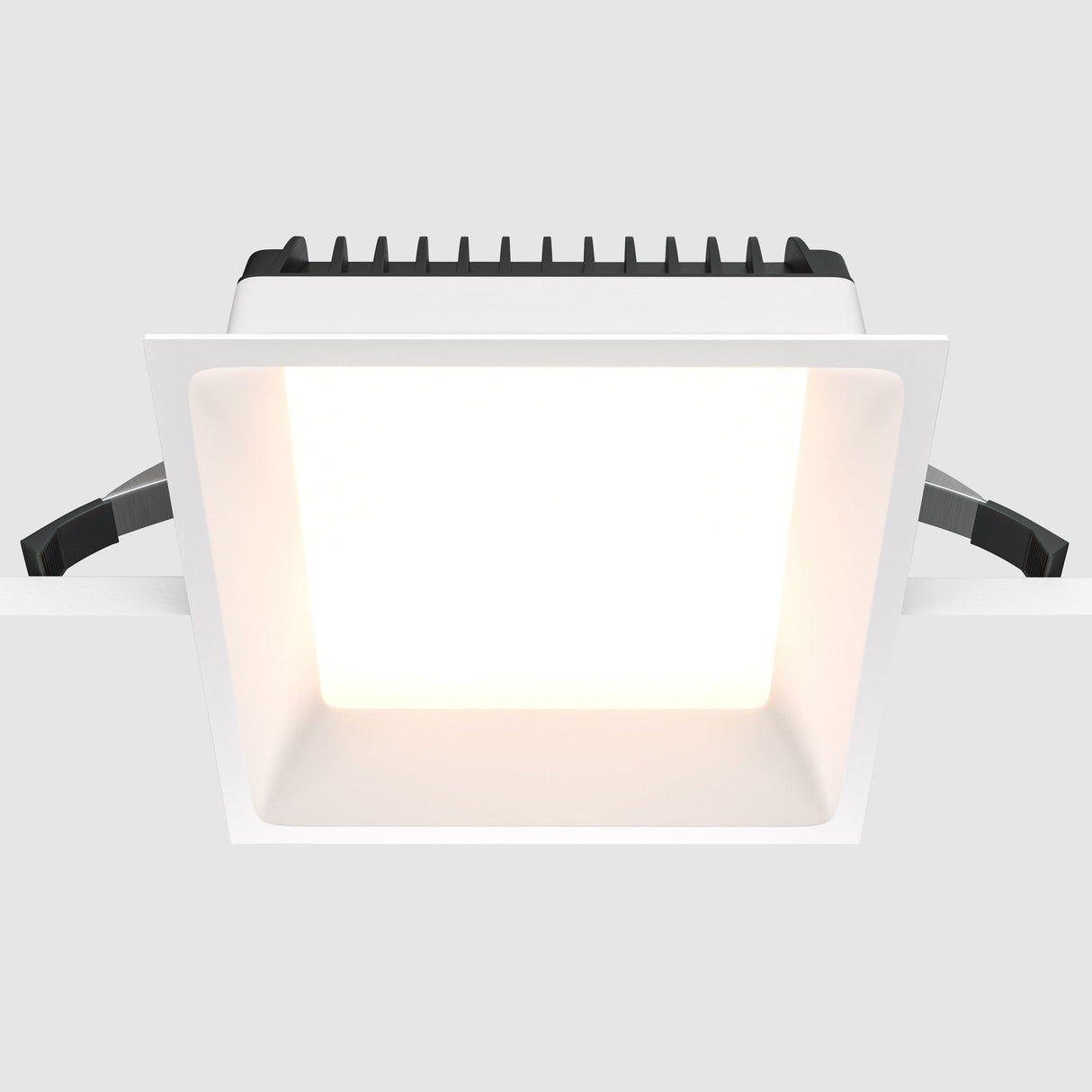 Side perspective of Okno LED Square Recessed Downlight in white, showcasing its low-profile and stylish square frame