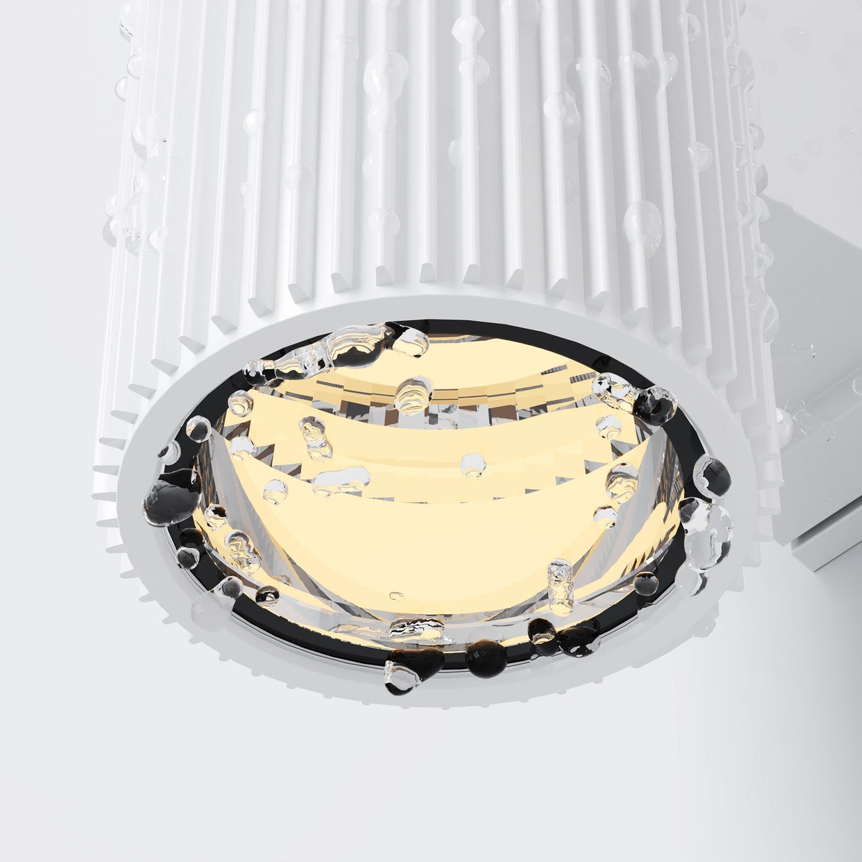 The Rando Outdoor Up & Down Wall Light - White is a modern, cylindrical fixture with a ribbed exterior, offering up and down illumination. Its interior features clear beads resembling water droplets, and it is corrosion-resistant, complementing any light-colored surface.