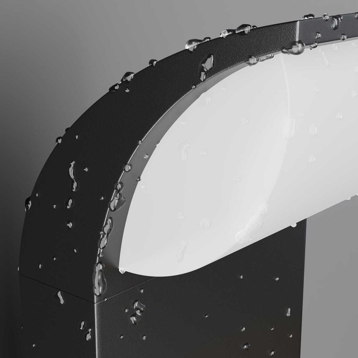 Close-up of a curved surface with water droplets. The matte graphite finish contrasts with the glossy white, resembling the Stock LED Bollard Light 3000K 7W. Droplets glisten like integrated LEDs against the gray background for a fresh, wet look.