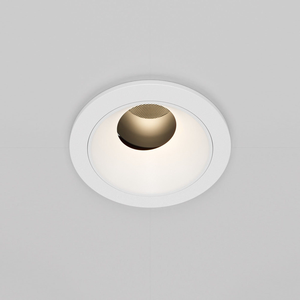 The Wise LED Round Recessed Downlight 7W features a sleek circular white trim and metallic interior, providing soft 3000K light for your space.