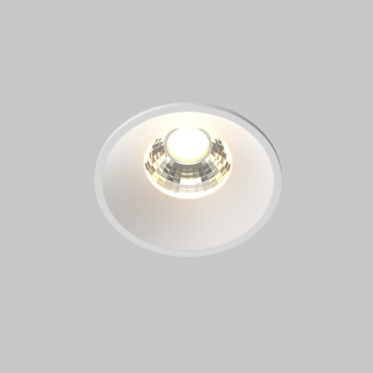 Close-up of the Round LED Recessed Downlight 7W 3000K - White on a gray background, featuring a circular reflector and durable aluminum construction that emits a warm 3000K glow, offering a modern and minimalist look.