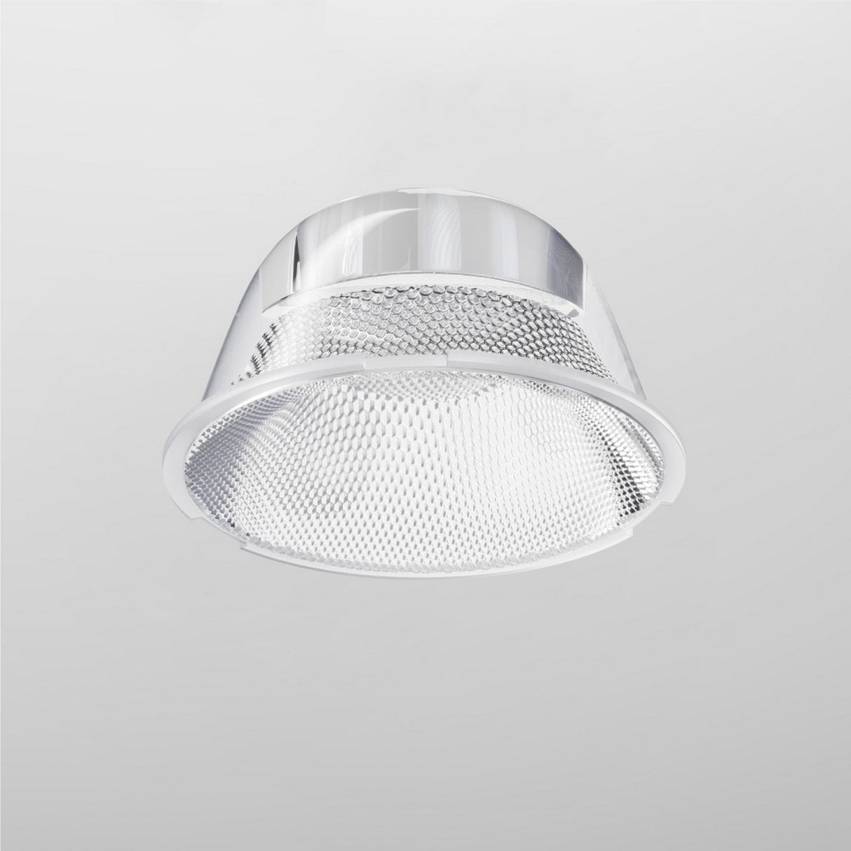 The Focus LED Track Light Lens ⌀43mm 15° is a metallic ceiling fixture with a circular mesh-patterned cover, offering narrow beam lighting. It has a shiny, reflective surface and an industrial design against a plain light gray background.