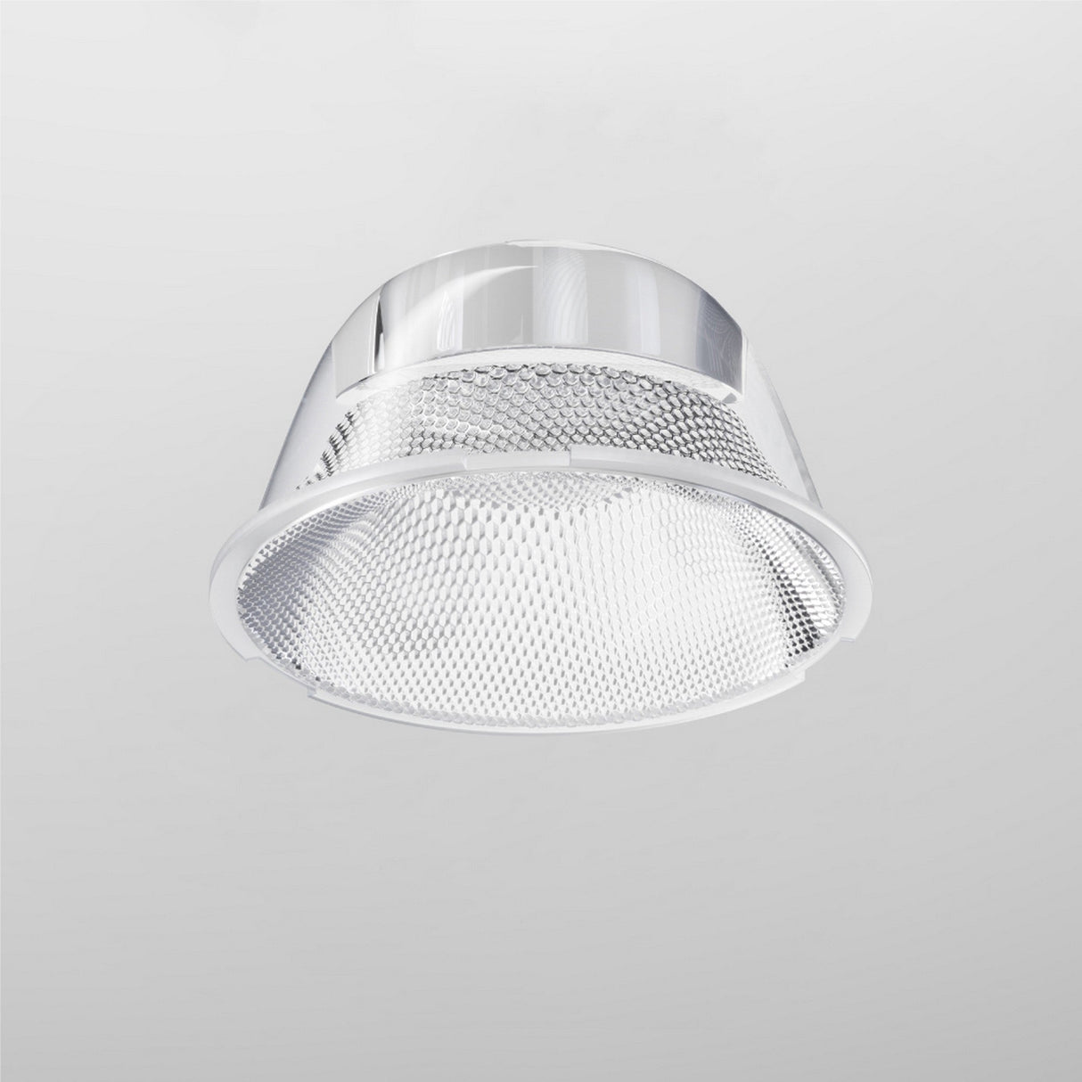 A metallic, circular ceiling light fixture with a mesh design and reflective rim is mounted on a white ceiling. The modern, minimalist style is highlighted by the Focus LED Track Light Lens ⌀43mm 36°, offering flexible beam angles for perfect ambient lighting.