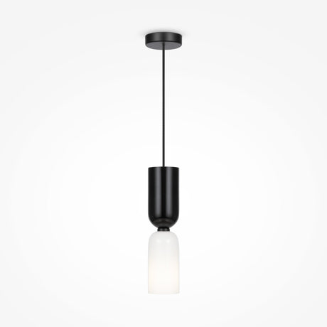 The Memory Hourglass Pendant Light features a black cylindrical fixture with a white frosted glass shade, hanging elegantly from a thin black wire and round ceiling mount, making it an ideal addition to modern interiors for ambient lighting against plain white backdrops.