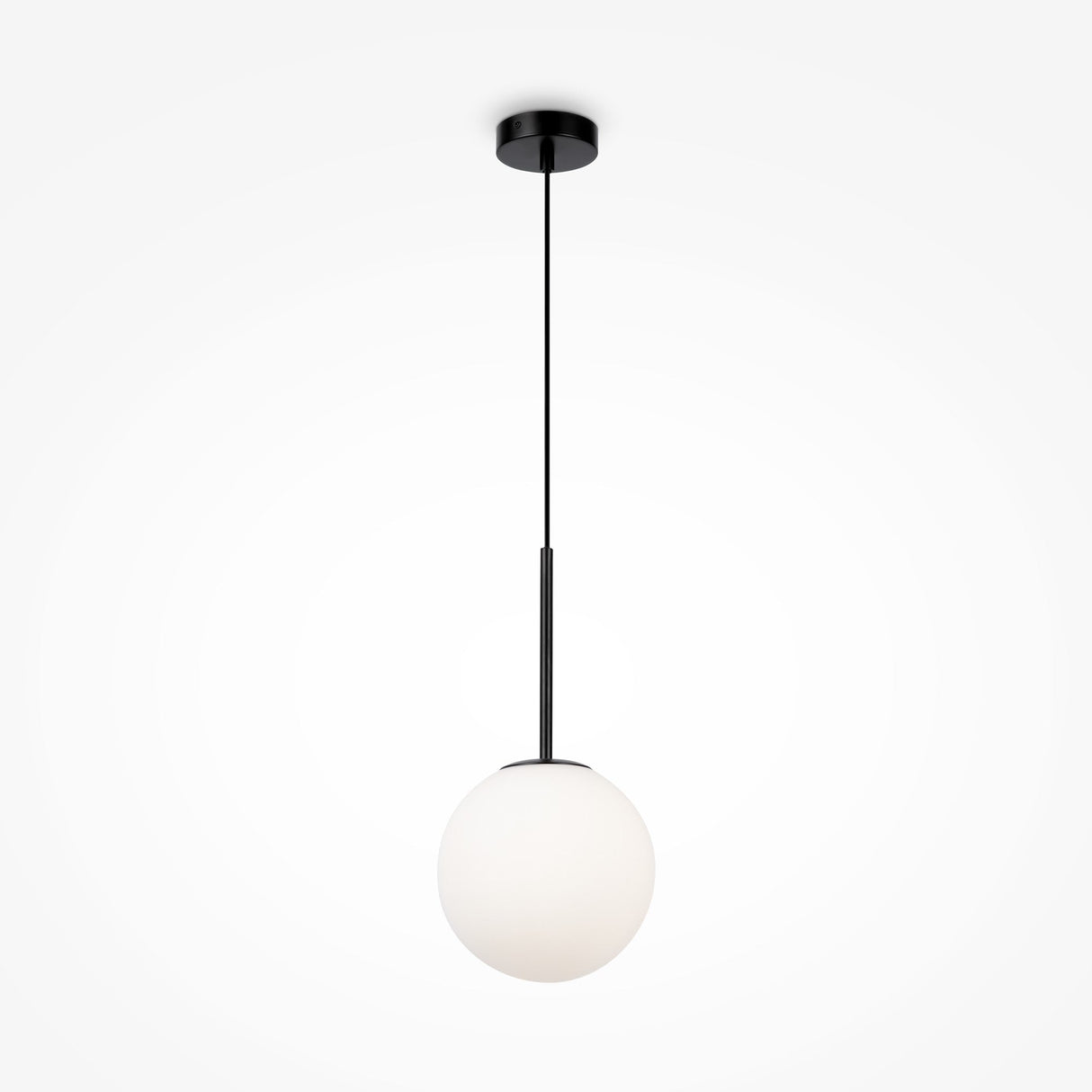 The Basic Form Globe Pendant Light 20cm in Black, with frosted white glass, features a sleek metal frame and hangs elegantly from the ceiling, casting a soft ambient glow. Its minimalist and contemporary design suits any stylish space.