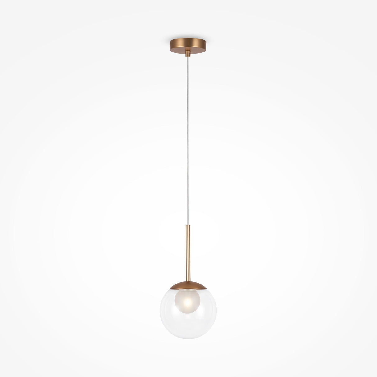 The Basic Form Globe Pendant Light 15cm elegantly hangs with a gold finish and a frosted and clear glass globe shade, featuring a minimalist spherical bulb within, all set against a plain white background.