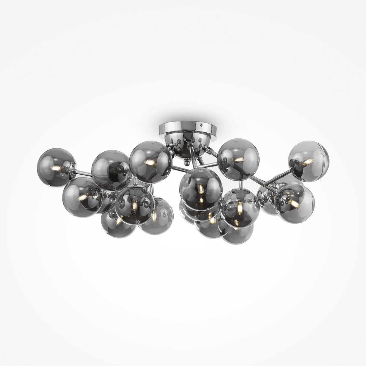 The Dallas 20 Light Semi-Flush features a modern industrial design, with a chrome structure supporting an arrangement of smoky glass bulbs, each containing a small light.