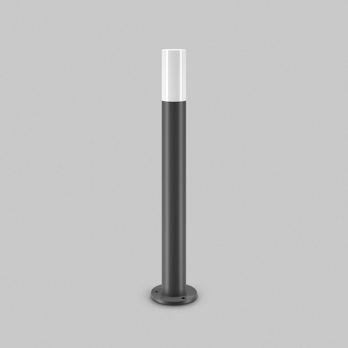 The Willis Bollard Light 80cm, featuring a cylindrical design with a black base and white translucent top, is perfect for enhancing garden pathways. With a modern look mounted on a flat base, it offers sleek outdoor lighting on a plain gray backdrop.