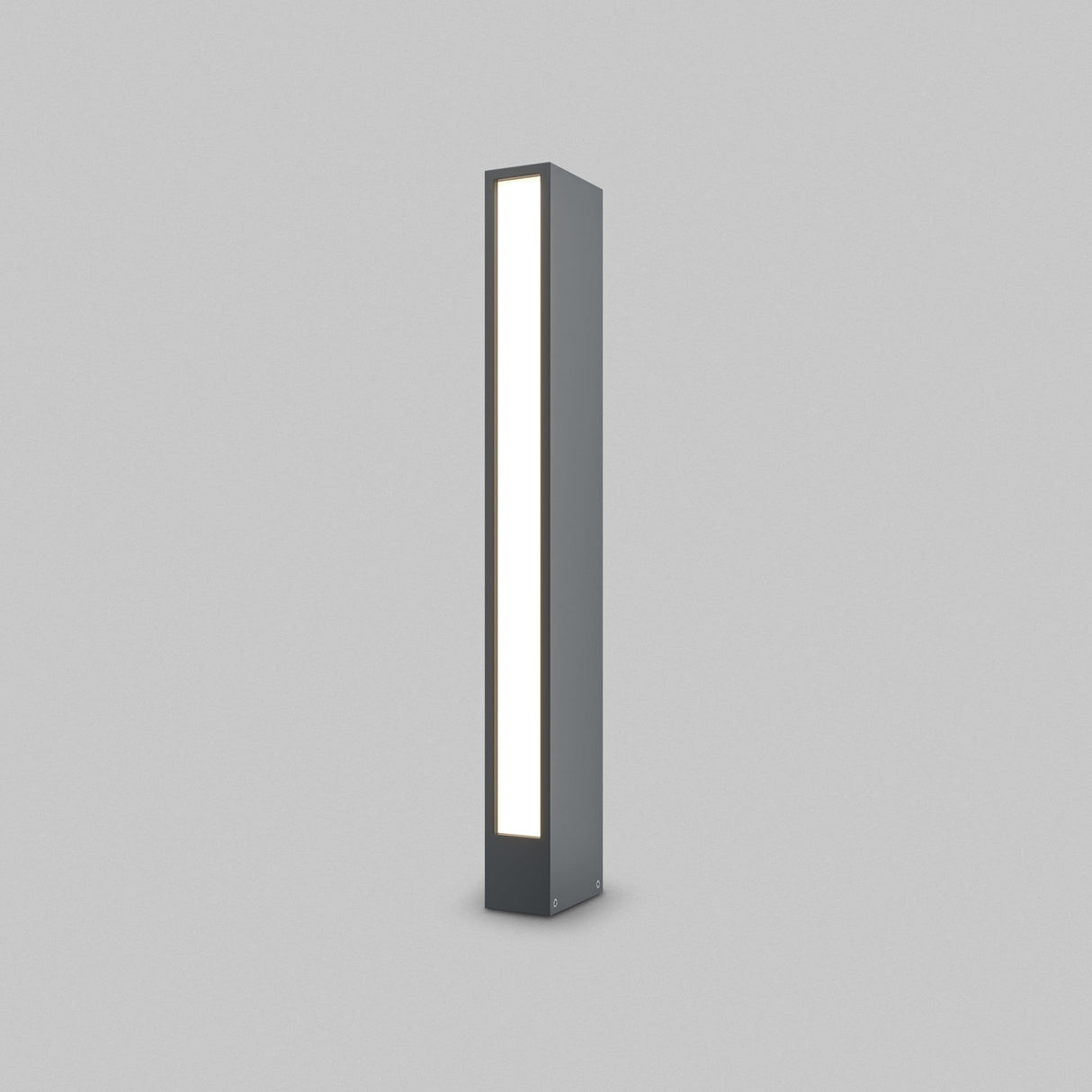 The Hof LED Pedestal Light 60cm in Graphite is a modern, minimalist rectangular fixture with a dark frame and bright white light panel against a neutral gray background. Ideal for outdoor lighting, it radiates a soft glow, showcasing its sleek and simple design.