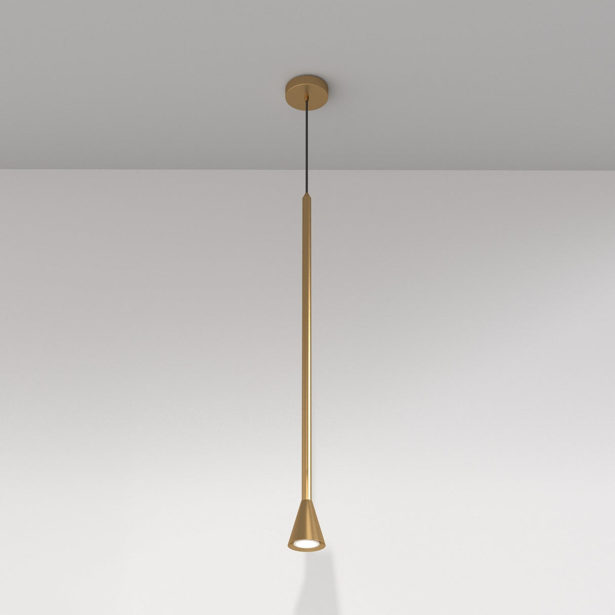 The Arrow 1 Light Long Cone Pendant - Gold, with a gold finish rod and small cone-shaped light, is elegantly suspended from the ceiling against a plain white background.