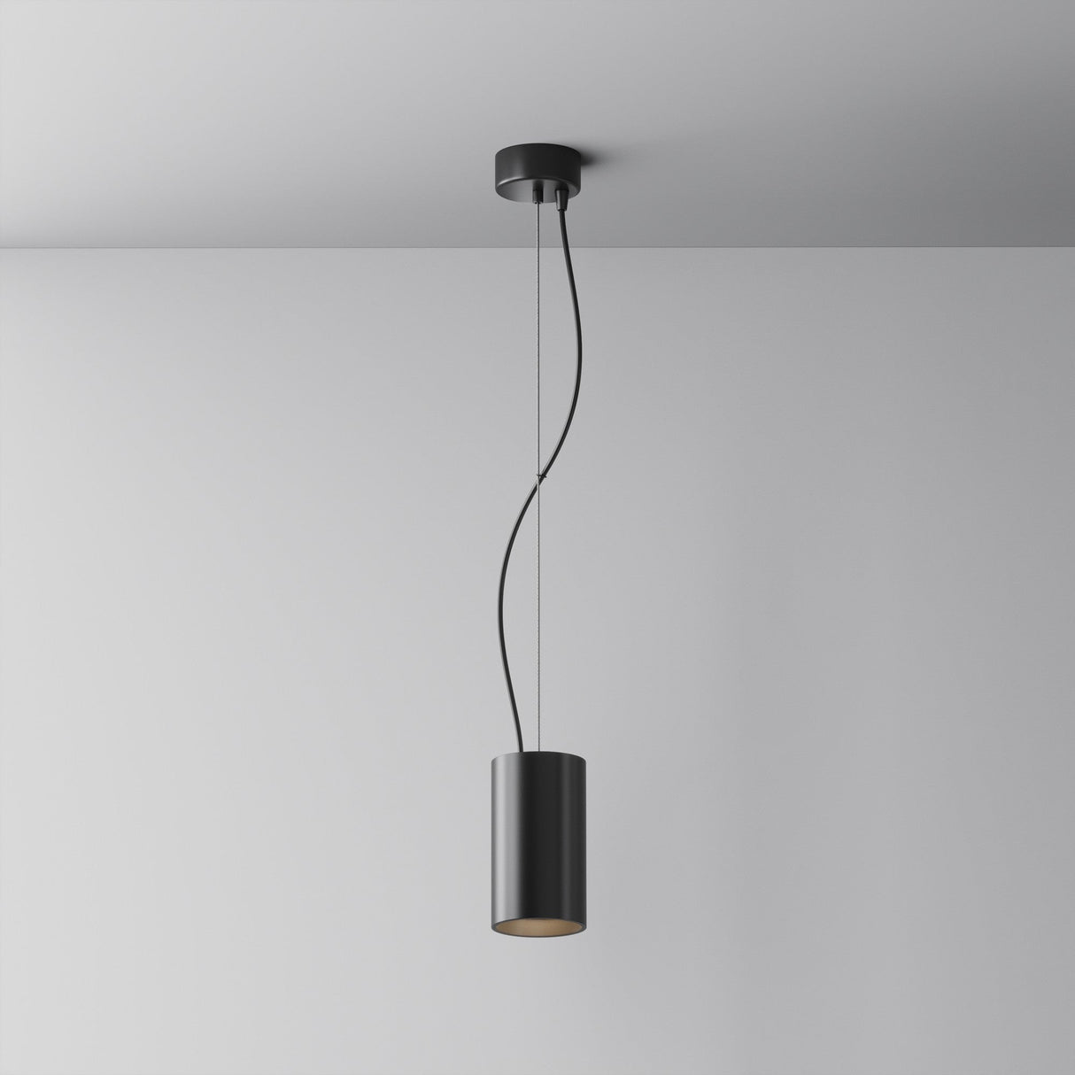 The Efir LED Pendant Light 15W in black hangs from a white ceiling, showcasing two thin, slightly curved wires that elegantly connect the energy-efficient fixture to the mount against a plain gray wall.