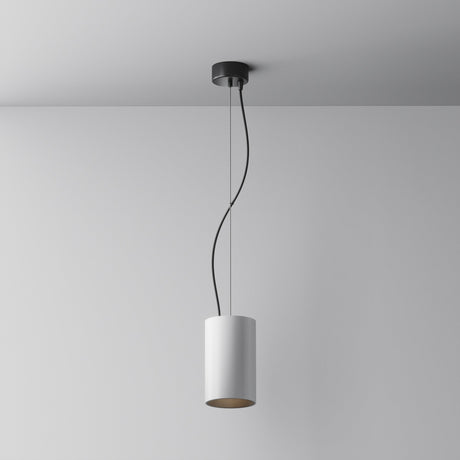The Efir LED Pendant Light 25W in white features a minimalist design with a cylindrical white shade and black ceiling mount, hanging from two black cords for an energy-efficient, sleek look against the plain ceiling backdrop.