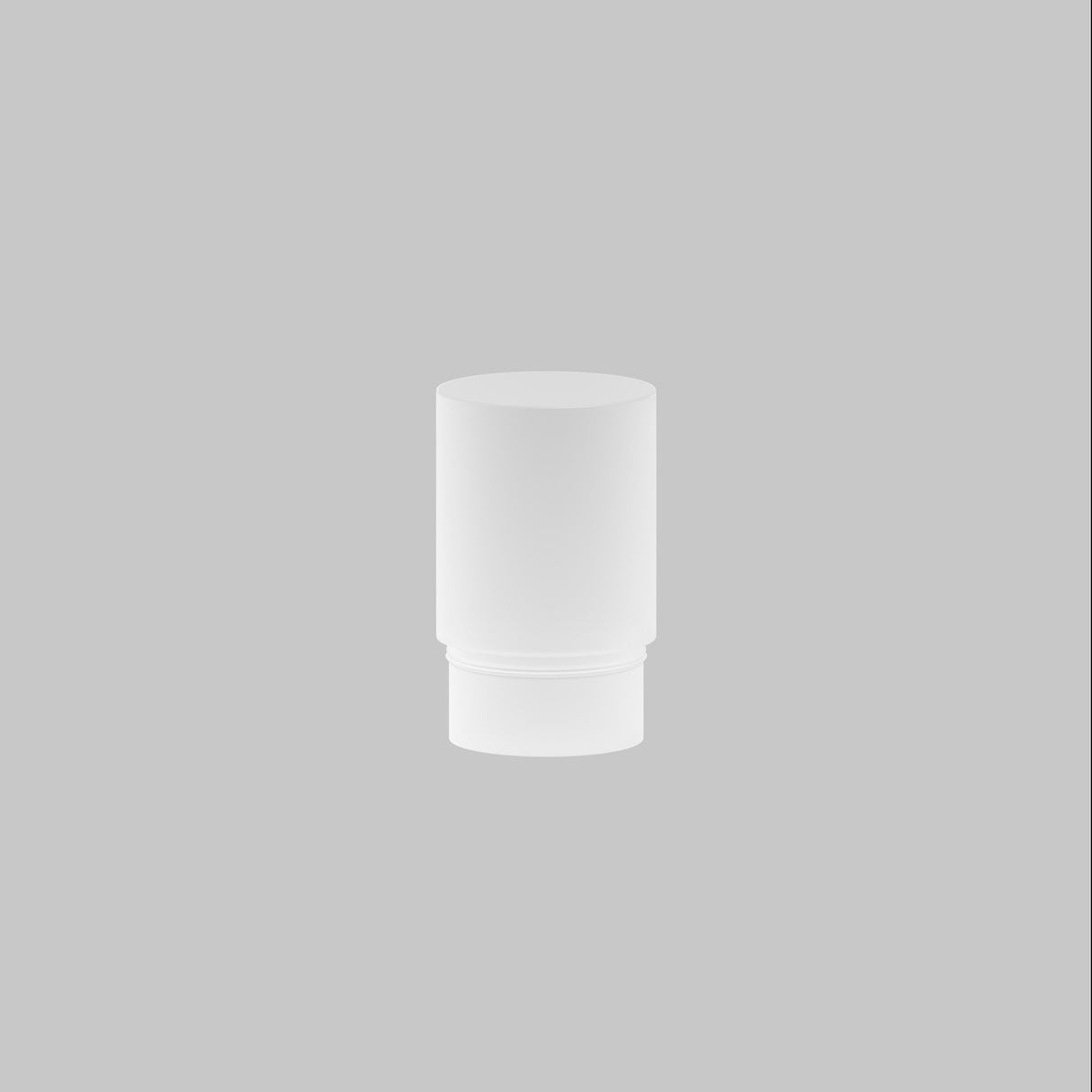 A white cylindrical container, likely for cosmetics or toiletries, is centered on a light gray background, illuminated by the softening effect of the Focus LED Light Diffuser Medium 5W.