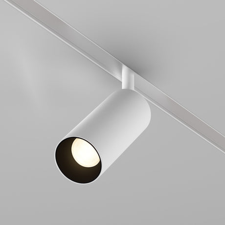 The Focus LED DALI CCT Magnetic Exility Track Spotlight 12W 2700-6000K in white is a ceiling-mounted fixture with a cylindrical design, providing a soft glow. Its sleek minimalist look suits modern interiors and supports DALI dimming for customizable ambiance.