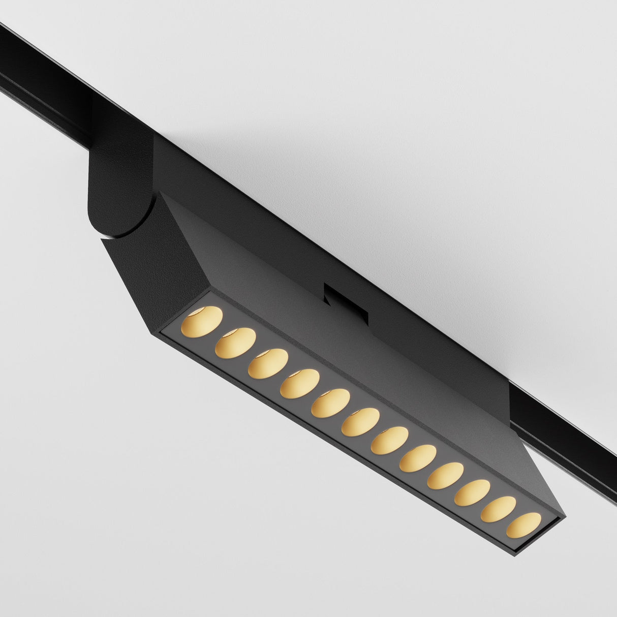 The sleek black Points Rot track light fixture, with 12W, features a modern design with twelve small round bulbs for focused illumination. It offers DALI CCT LED dimmable adjustability, ensuring optimal color rendering and ambiance customization from 2700-6000K.