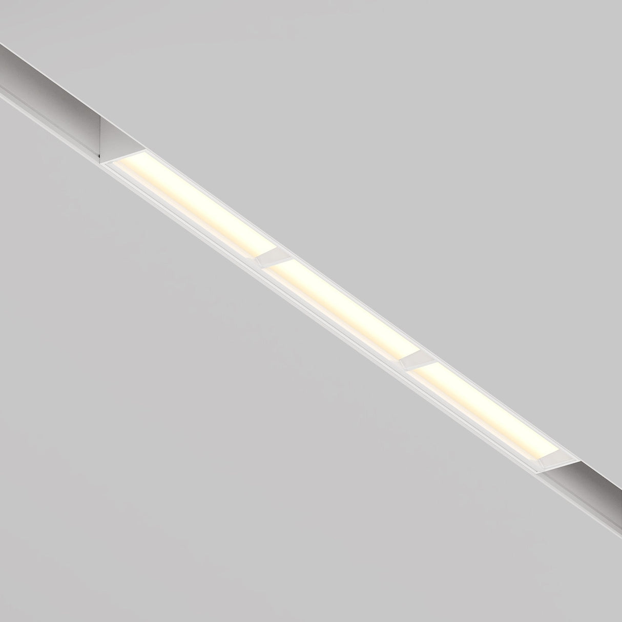 The Parete LED Linear Track Light for Magnetic Exility 18W 3000K emits a warm glow with wall-washing optics. Set in white ceilings with elongated rectangles, it provides sleek, minimalist illumination that blends seamlessly with your decor.
.