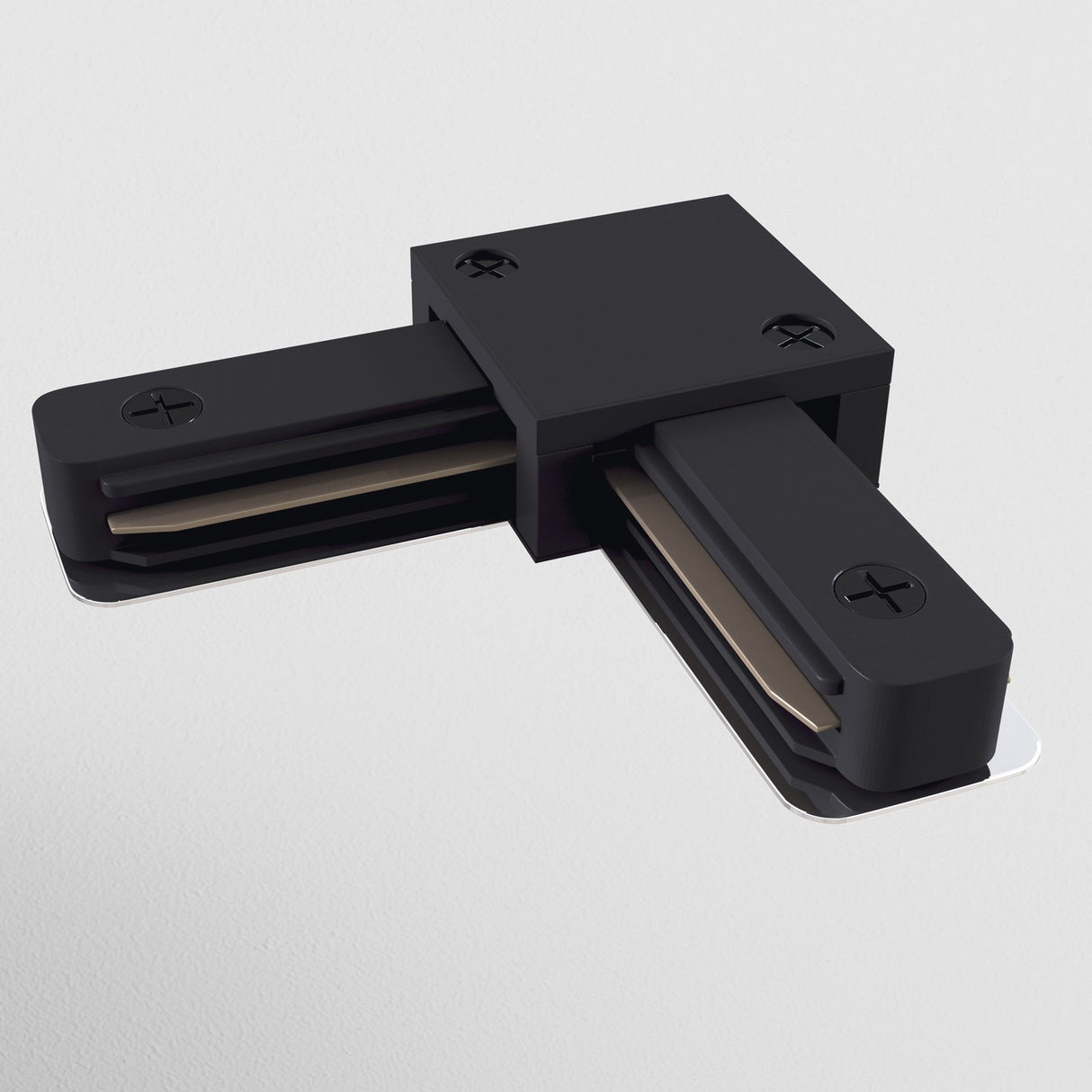 The Unity Single Phase Surface-Mounted Track L-Connector - Black, featuring visible screws and metal components, is set against a plain white background.