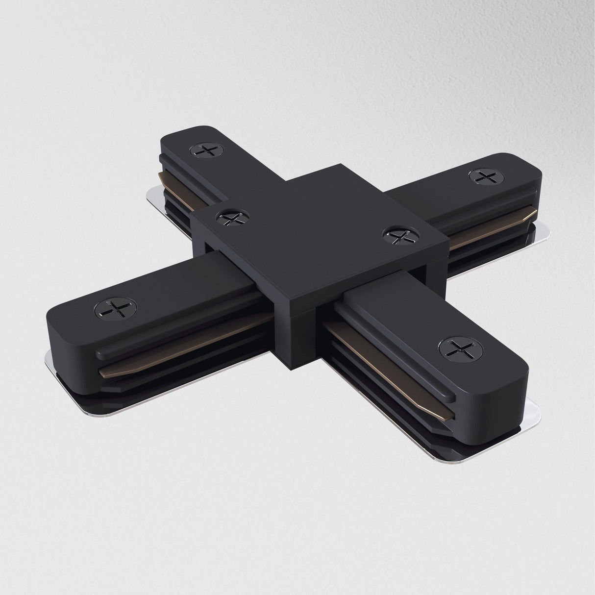 The Unity Single Phase Surface-Mounted Track X-Connector in black features an X shape with four arms on a light gray background, each with visible screws and metal contacts, suggesting its a multi-directional lighting connector.