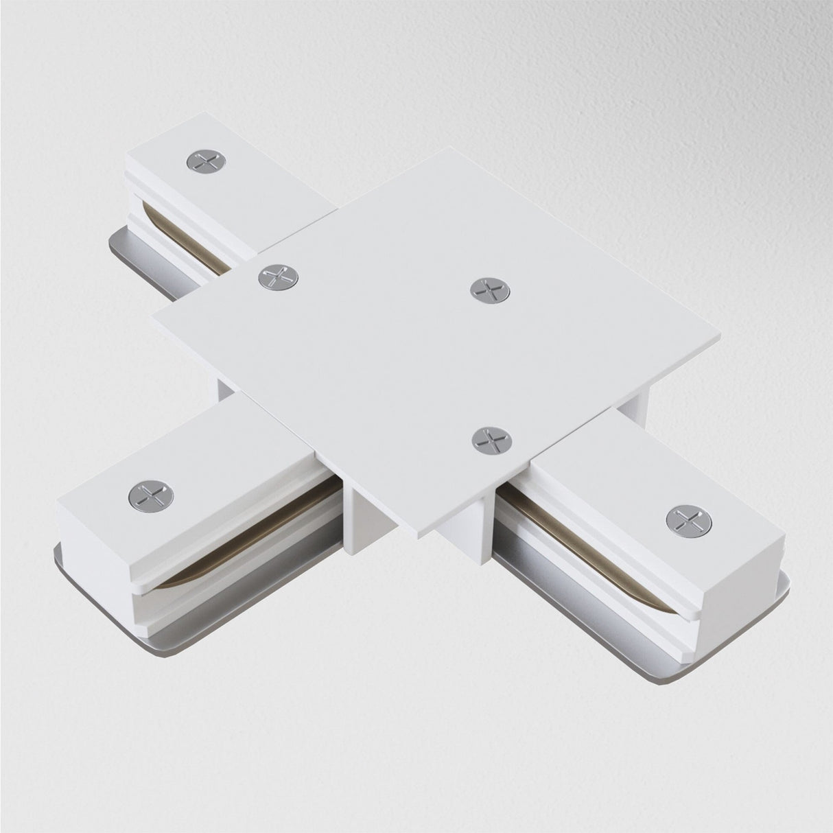 The Unity Tracks Recessed T-Connector in white, with a square central panel and four extensions, joins single-phase track systems. It includes four top screws for flexible lighting setups, shown on a plain white background.
