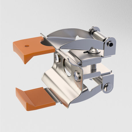 The Single Phase Unity Tracks Built-in Spring Holder - Silver features a metallic hinge mechanism with orange plastic grips at both ends, adjustable screws and spring, set against a plain light gray background.