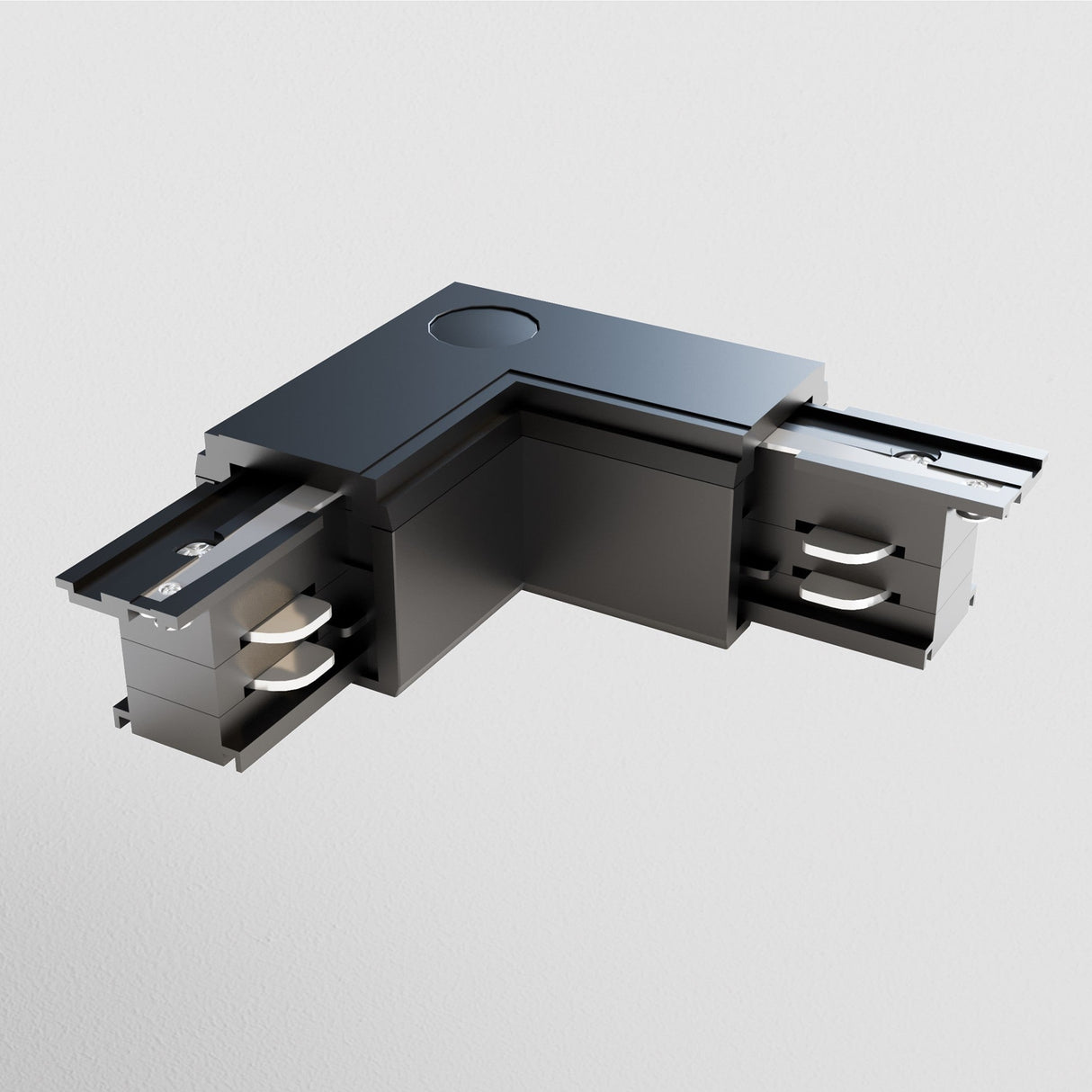 The 3-Phase Surface-Mounted Track Trinity Internal Corner Connector in black features a sleek, L-shaped design with visible wiring connectors and a simple mounting hole, ideal for flexible lighting configurations against a plain white background.