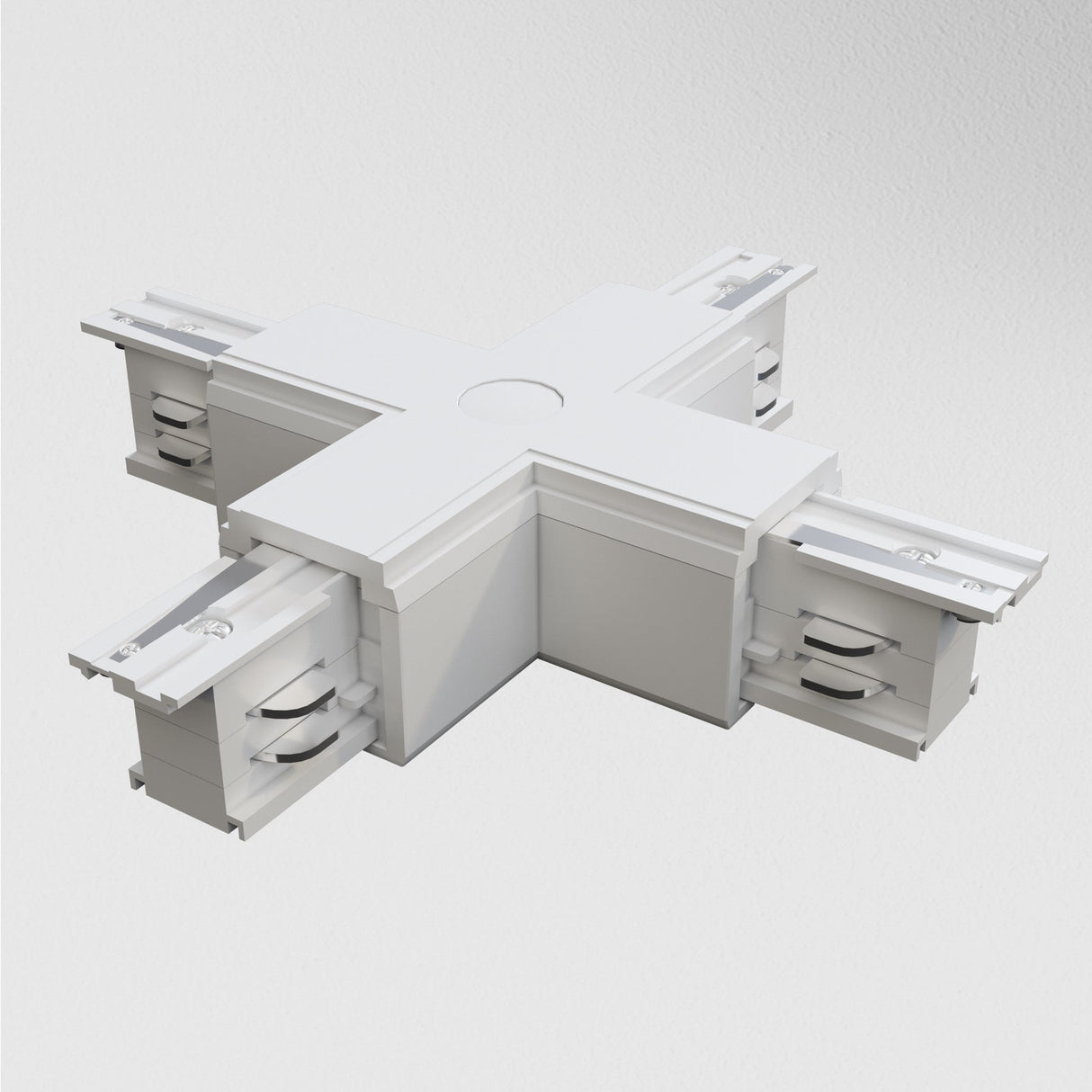 The 3-Phase Surface-Mounted Track Trinity X-Shaped Connector in white functions as an electrical junction box with four arms featuring tracks, designed for integrating three-phase track lighting systems on a plain white background.