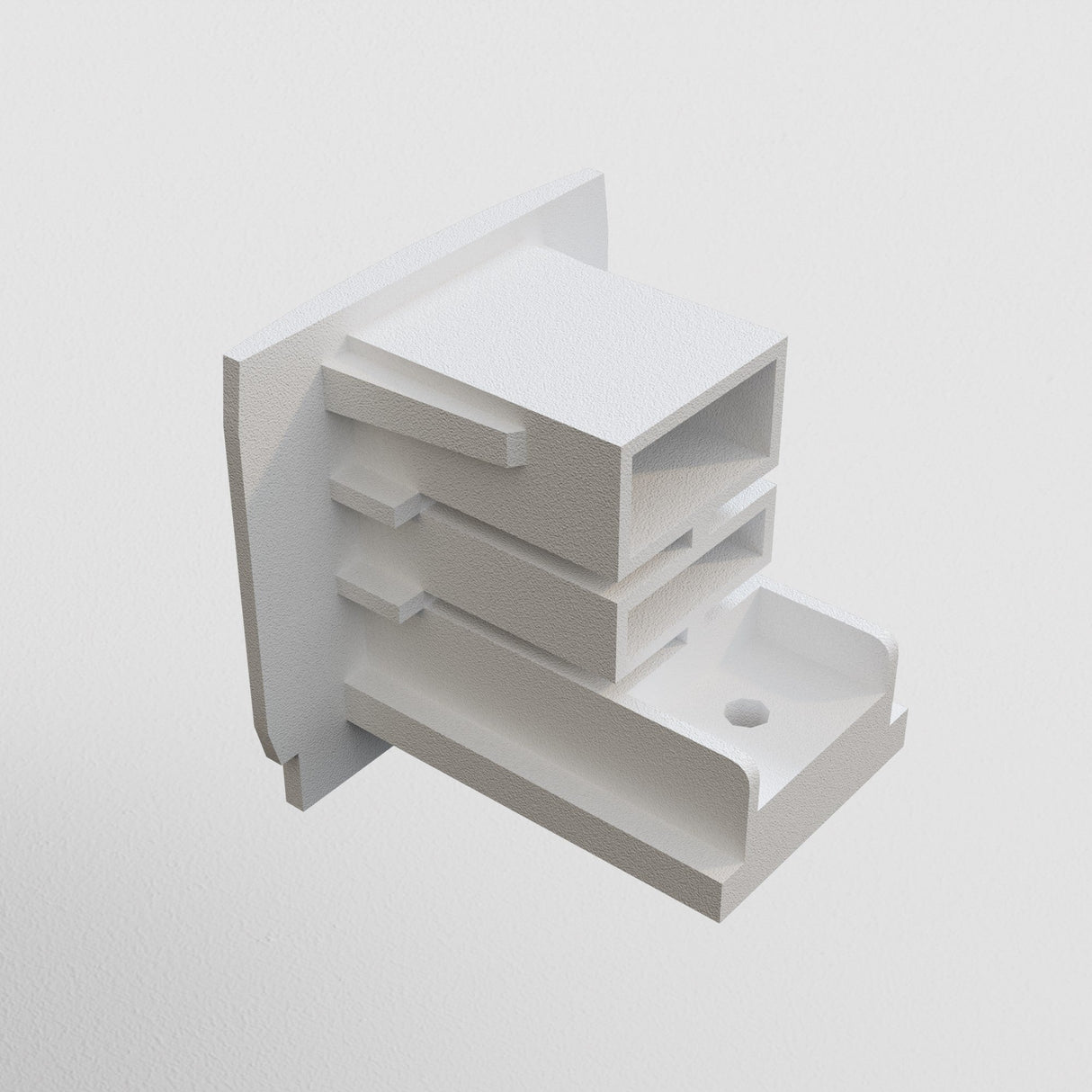 A 3D-rendered piece from the Trinity series features layered, rectangular shapes in white on a light gray background, echoing the style of the 3-Phase Surface-Mounted Track Trinity End Cap - White.