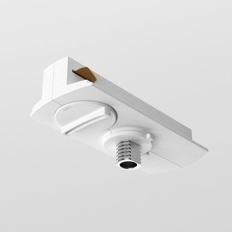 The Unity Single Phase Track Connector - White is a ceiling-mounted outlet with a metallic circular port for hanging fixtures. It seamlessly blends into white ceilings, making it ideal for modern track lighting systems.