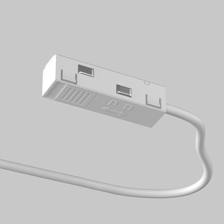 A close-up of a USB connector on a minimalist cable against a gray background, featuring a ridged texture and USB symbol, reminiscent of the sleek aesthetics in Exility Track Power Feed - White.