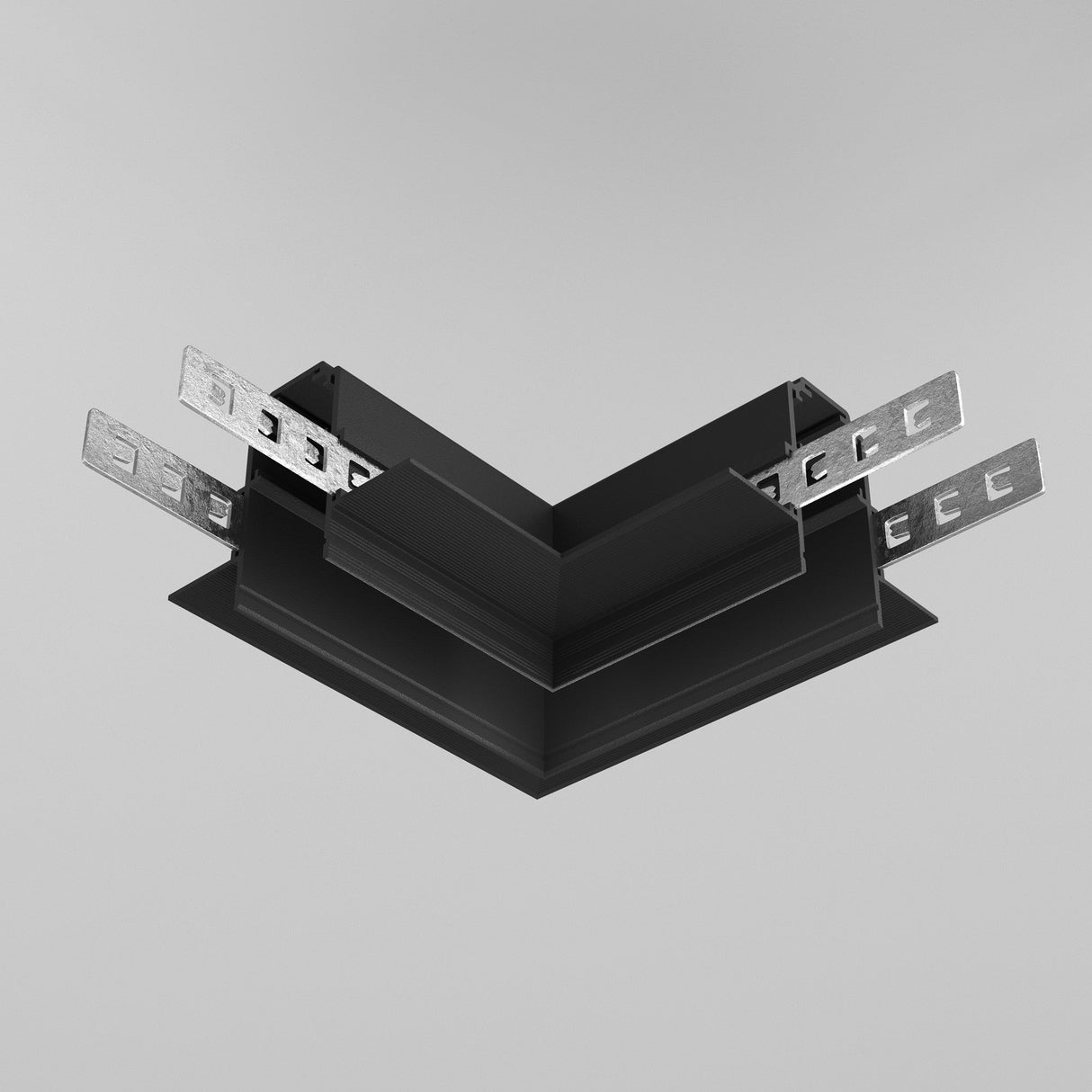 The Exility Tracks L-Shape Corner Connector in black, designed for 12.5mm plasterboard, is featured against a gray background. Ideal for modern interiors, it includes metal extensions with rectangular holes, complementing recessed track lighting systems.