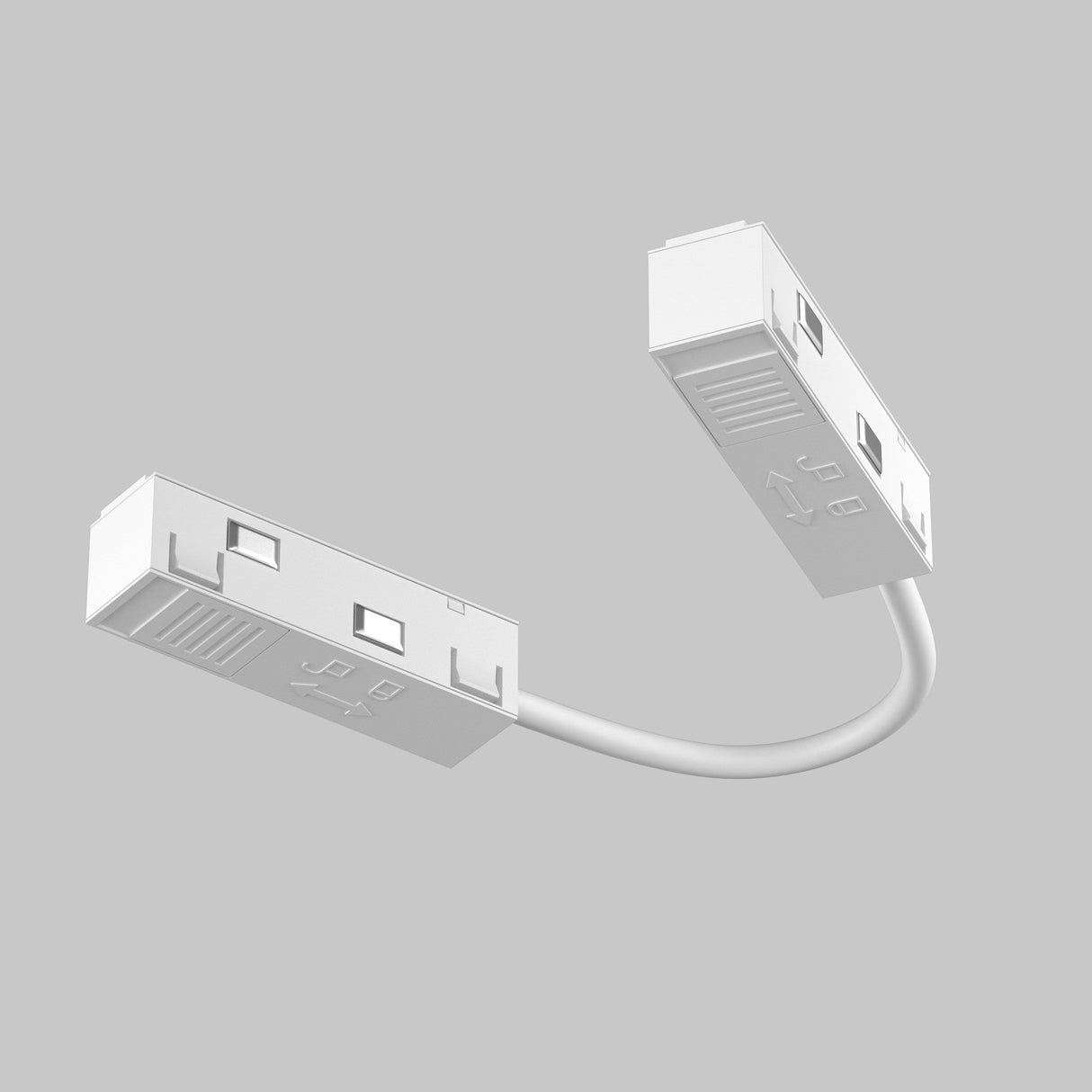 The Exility Track Flexible Corner Power Connector 15cm - White features two white rectangular connectors linked by a short cable on a light gray background, with engraved arrows and lines showing data flow directions for seamless power connectivity.