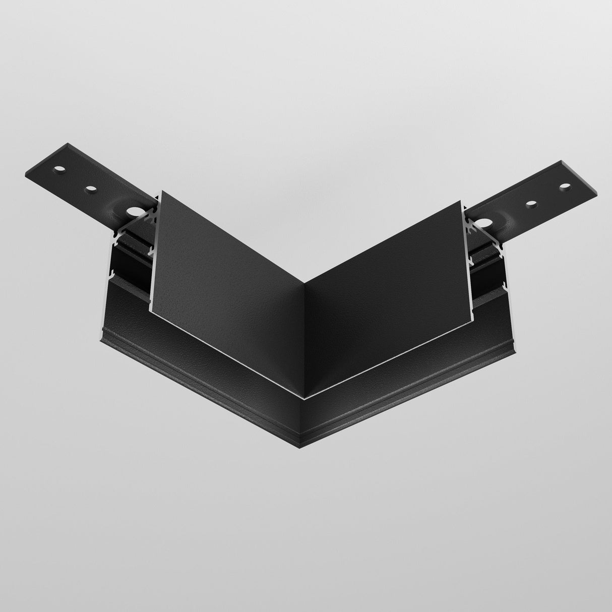 The Exility Magnetic Surface-Mounted Track Corner Connector in black is designed for structural support or connection at perpendicular angles and features mounting holes on a white background.