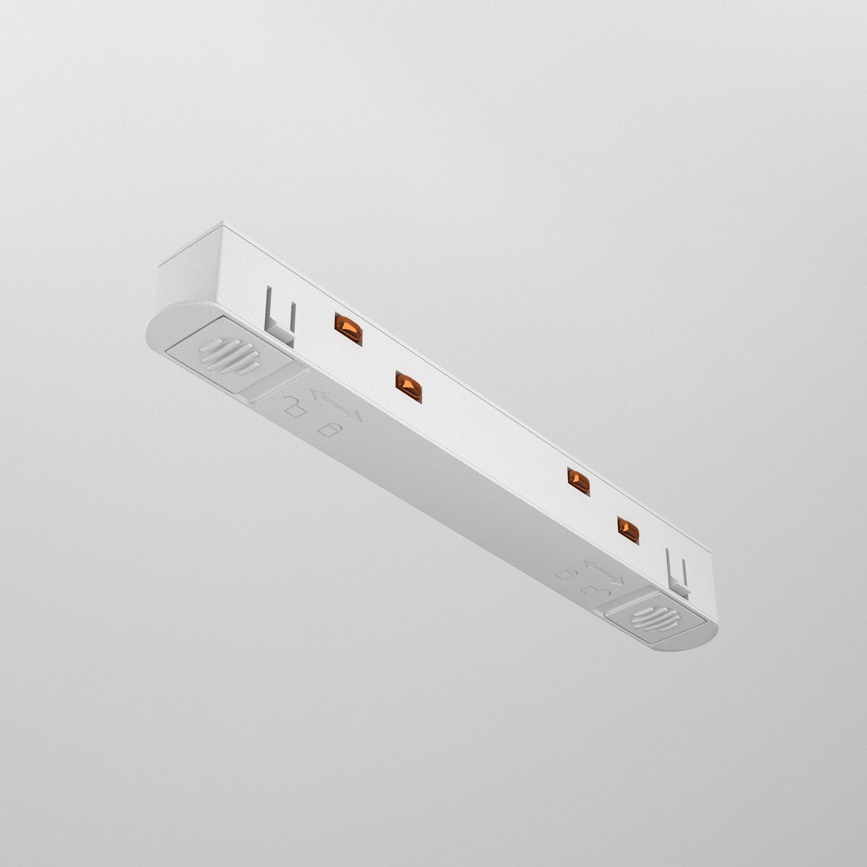 The Exility Track Straight Power Connector in white, featuring a sleek and minimalistic design with three outlets, is mounted on a light grey wall. Its straight power connector complements the subtle markings near the outlets.