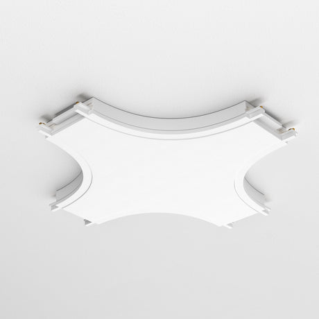 The Radity Magnetic Track X-Shaped Power Connector in white features a geometric, square design with rounded corners, integrating effortlessly into diverse lighting setups and blending seamlessly with the ceiling.