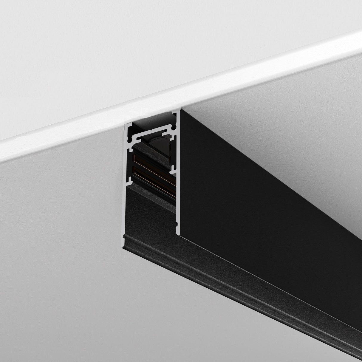 A close-up of the Exility Magnetic Surface-Mounted Track 2m in Black reveals an open sectional view, showcasing its industrial design and smooth finish. The 48V components contrast against a white ceiling, offering customizable lighting configurations for any space.