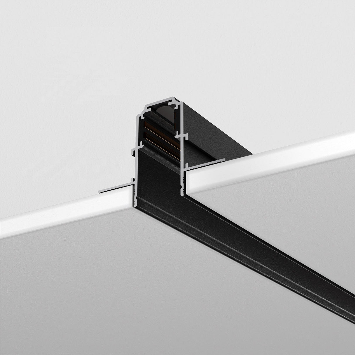 The Exility Magnetic Recessed Track 1m for Plasterboard 12.5mm in black, with its sleek T-shaped design, features intersecting horizontal and vertical components, creating a minimalist framework ideal for 48V lighting systems against a white background.