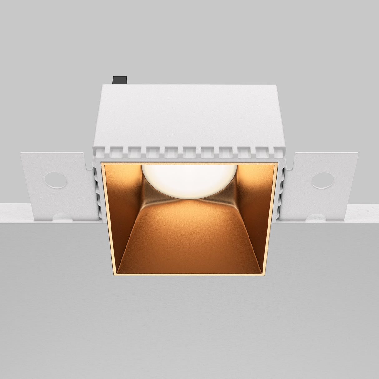 Control and mobility features of Share square plaster-in fixed recessed downlight in matte gold, ideal for flexible applications.