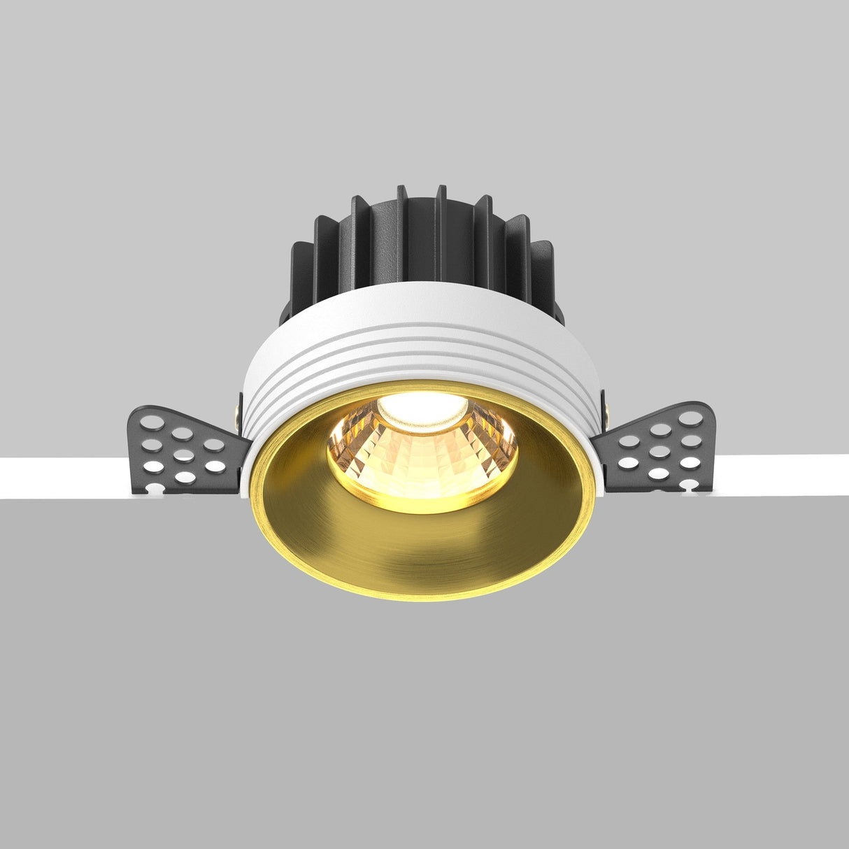 Control and mobility features of round LED recessed trimless downlight in brass, ideal for versatile lighting solutions.