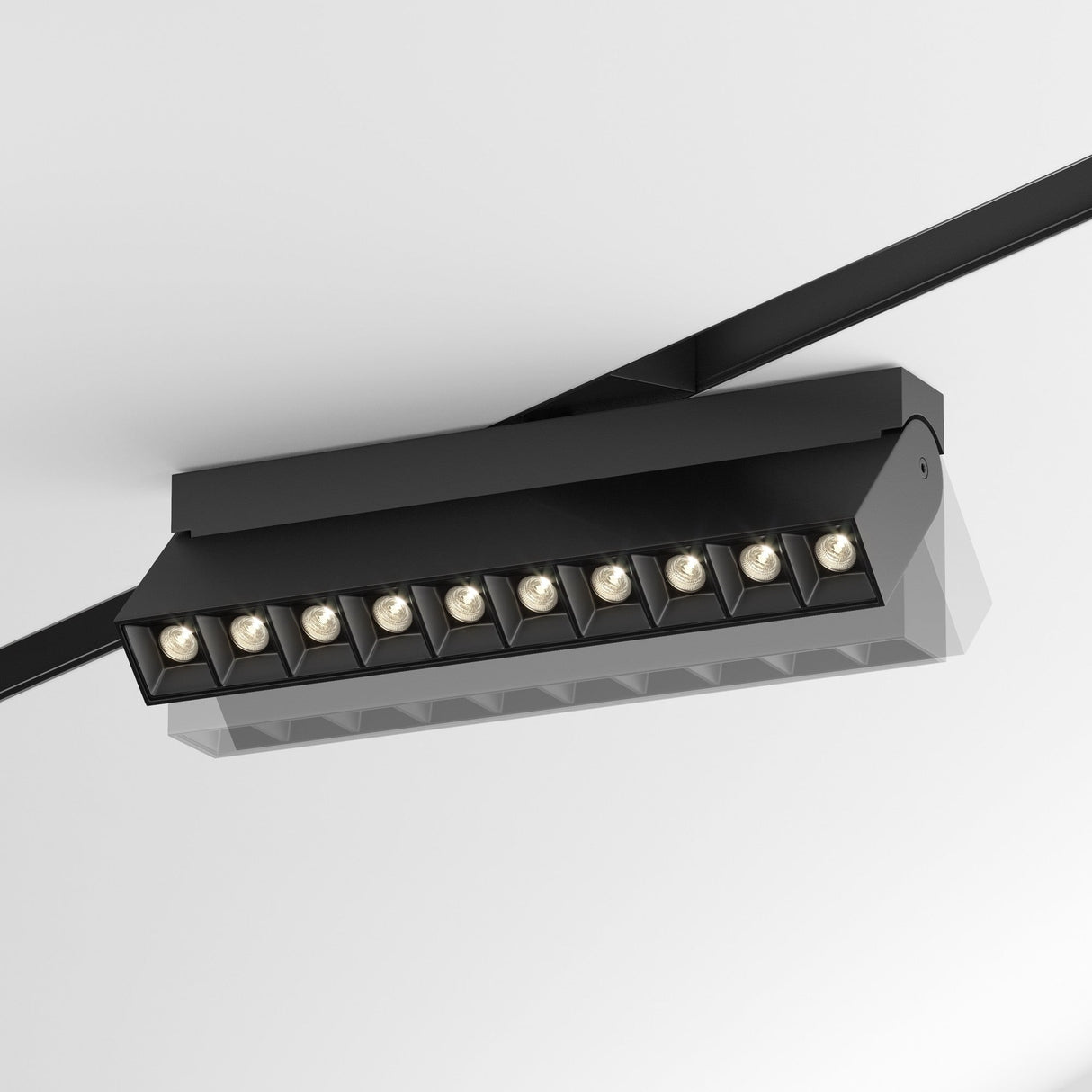 Close-up of Points Rot Linear track light in Black with flexible control and mobility for customized lighting.